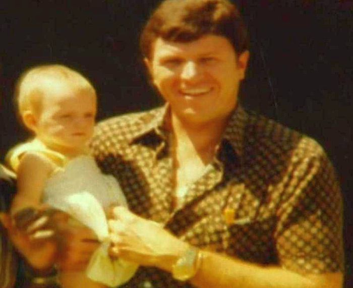 Baby Charlene Wittstock in her  father's arms